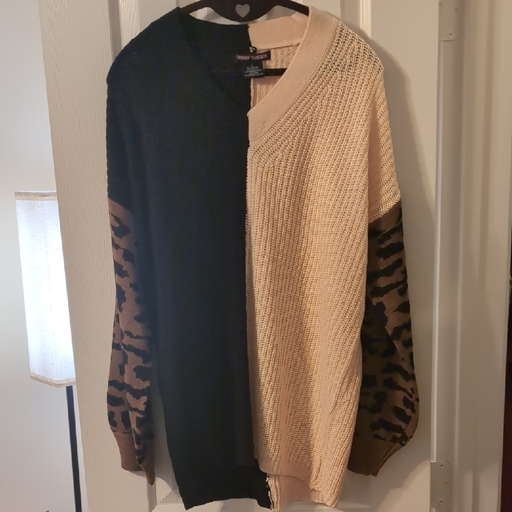 Trendy Threads Black and Cream Colorblock Sweater with Animal Print Sleeves